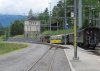 Crocodile train leaving Filisur with drinking Brits.jpg