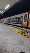 Birmingham New Street  WMR 323 30th April 2024.jpg