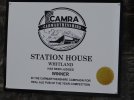 118. CAMRA POTY sign on the Station House, Whitland. Looks like a TGV Duplex..JPG
