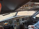 A320 cockpit at EMA.jpg