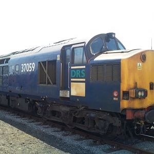 37059