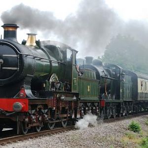 3440 + 44422 approach Gotherington Halt on the Gloucester And Warwickshire Railway.