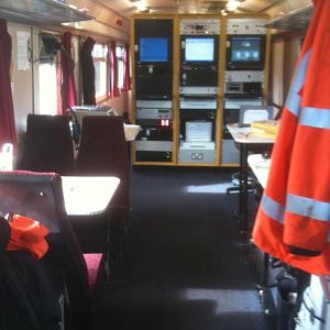 Interior of 999600, the recording coach on 950001 (pre refurb). Racks ahead contain the Track Geometry Computer, Real Time Positioning System manageme