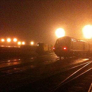 The limitations of the iPhone camera. NMT sits on shed at RTC Derby in the fog. The experimental MPV S&C video inspection vehicle sits behind on the w