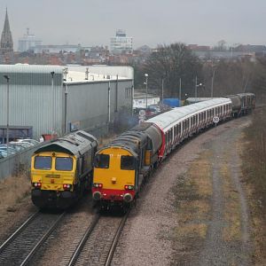 "Drag Race"

New S stock for LU being dragged towards Leicester on its way to Old Dalby. A freightliner 66 is seen overtaking it.

Geezah1984