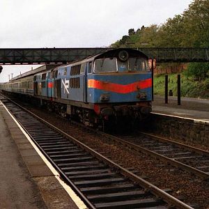 102 Lisburn 08 10 1988
This is the last time the Hunslets ever worked the Enterprise.
102 leading 101 pausing at Lisburn to set down passengers