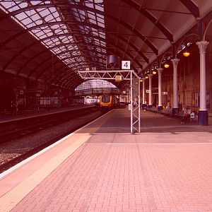 A Voyager, conveniently framed by a signal post, stands in Platform 4.