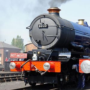 6023