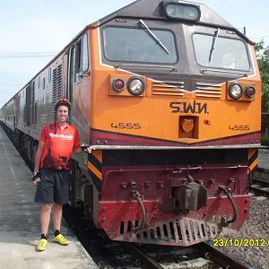 Me with a Thailand loco and train somewhere in Thailand during my second bike tour of the country.