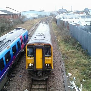 Trains passing at the location of the once proposed Grimsby Central station. It is the only passing loop between Grimsby Town and Cleethorpes.