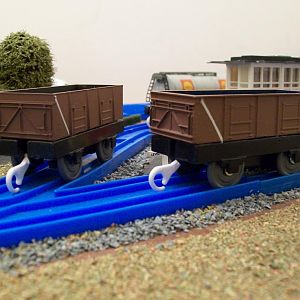 Re-painted Hornby 21 ton mineral wagons.
One of them is quite ancient and started life in the private owner "Norstand" blue  livery, while the other