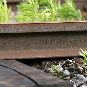Steel rail 1127 Rail from England, installed on Grand Trunk Railway, 1889 [Canada] still in use on a siding in Prescott Ontario. Some old rail never r