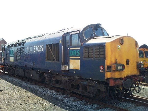 37059